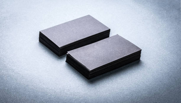 istock Stacks of black blank business cards 1262306192