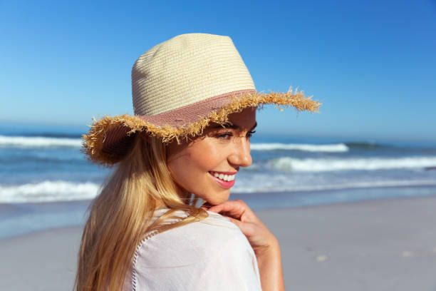istock Caucasian woman enjoying at beach 1262306513