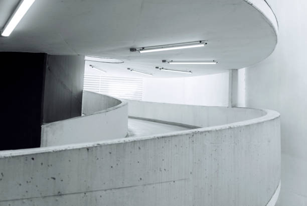 Empty underground garage inteior with concrete wall and floor