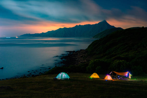 Camping Tent in Grass Island, Hong Kong Camping Tent in Grass Island, Hong Kong hiding place stock pictures, royalty-free photos & images