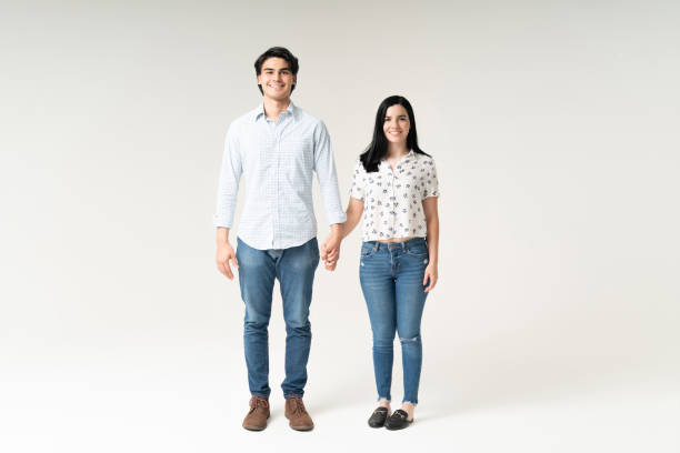 istock Happy Boyfriend And Girlfriend Standing In Studio 1262313889