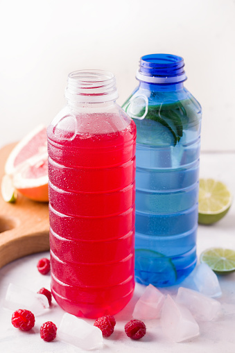 Chilled isotonic sports drinks with lime and raspberry
