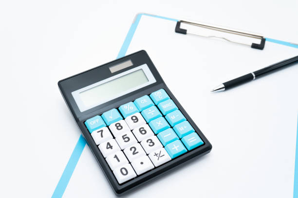 istock Clipboard and calculator on a white background 1262315551
