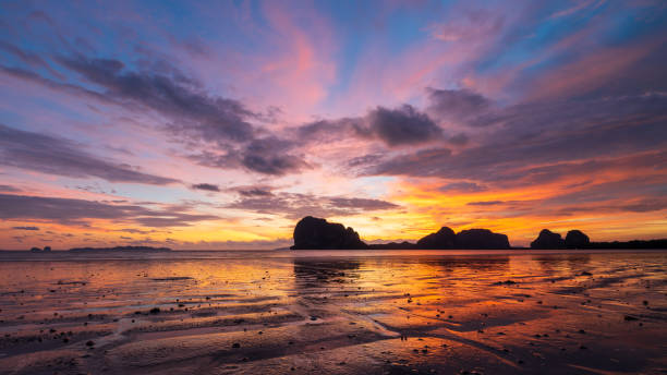 istock wilight sky with beach and mountains 1262316893