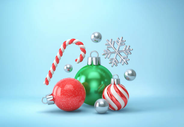 istock Christmas decor on blue background. Christmas balls, candy cane and silver snowflake 1262317059