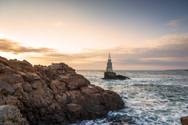 istock Sunrise at the lighthouse in Ahtopol, Bulgaria. 1262321025