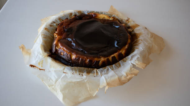 istock Basque burnt cheesecake freshly baked on the white background 1262327525