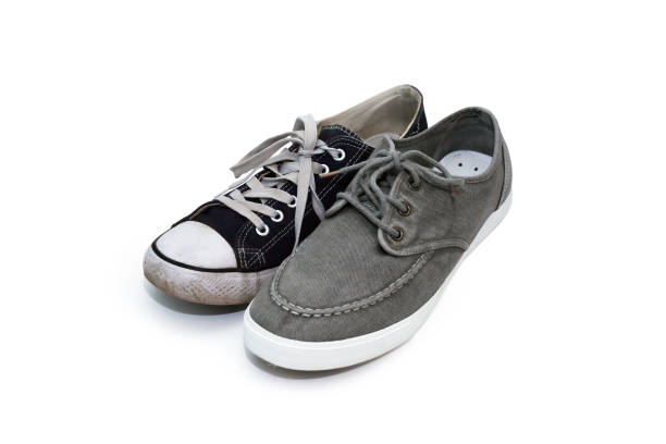 istock Pair Of  Different Sneakers 1262330220