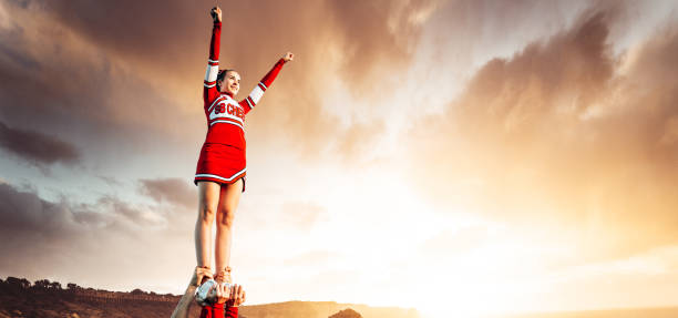 cheerleader on top of the world cheerleader on top of the world cheerleader photos stock pictures, royalty-free photos & images