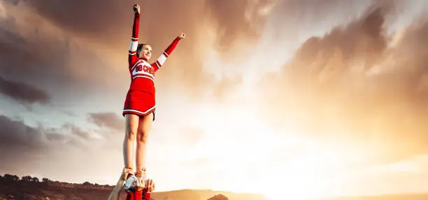 cheerleader on top of the world