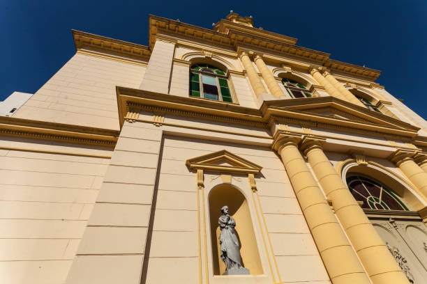 istock Ancient church, wide-angle view from the outside, with blue sky 1262339088