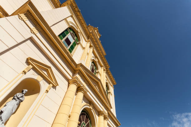 istock Ancient church, wide-angle view from the outside, with blue sky 1262339090