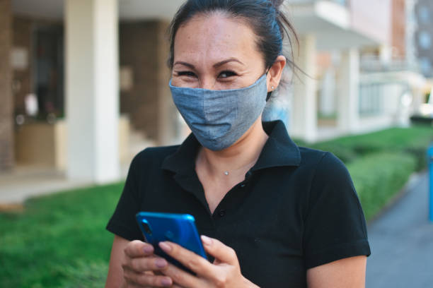 istock Woman with face protective mask 1262352900