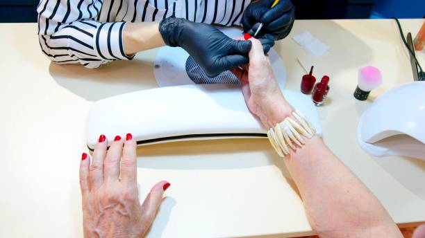 istock a polishing of fingernails  during a manicure session 1262357059