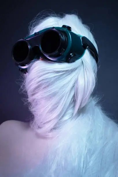 Photo of Girl in dark glasses and wrapped hair around her head