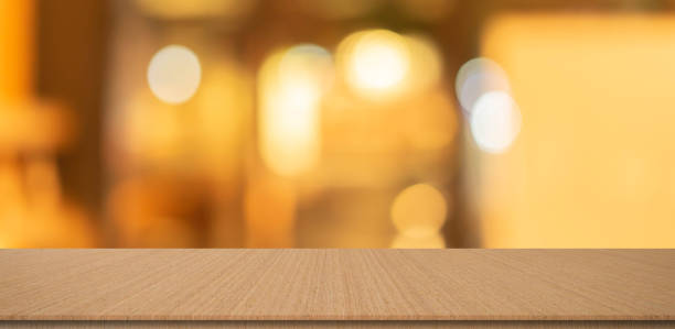 istock abstract blurred inside corridor interior of luxury restaurant bar background and modern wood counter table perspective background for show, promote, advertise product on display montage concept 1262360180