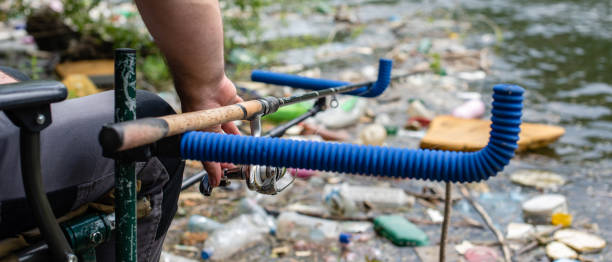istock Garbage in the river stock photo 1262378330
