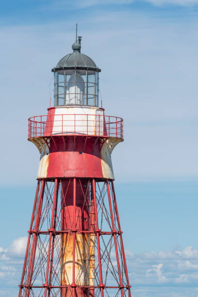 istock Red and white lighthouse at Maseskar in Sweden 1262378616