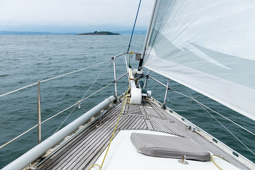 sea view from the deck of a white sailing yacht, cruise travel concept, sea vacation