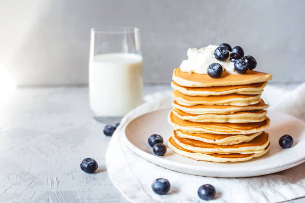 istock Stack of pancakes with fresh blueberry. 1262383586