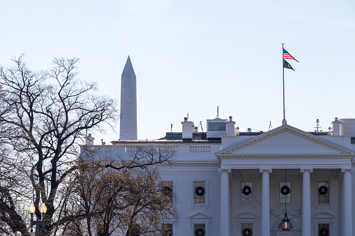 Close-up of The White House, north side seen on a clear day with the Washington Monument in the background.