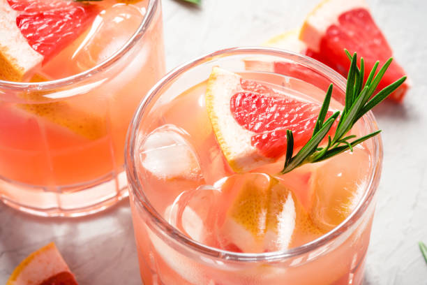 istock Refreshing grapefruit cocktail with ice and rosemary. 1262383713