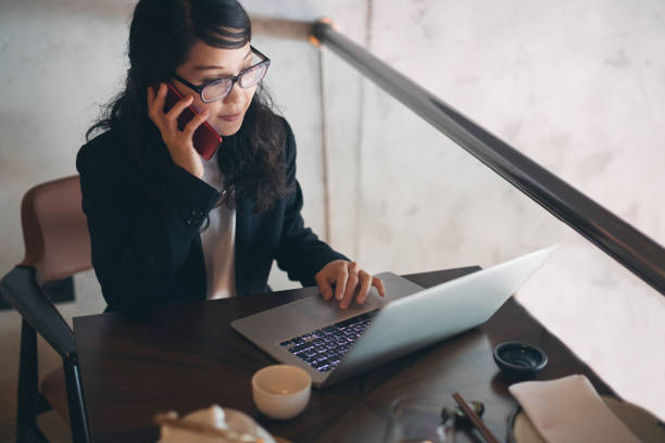 istock Young businesswoman working at restaurant 1262385158