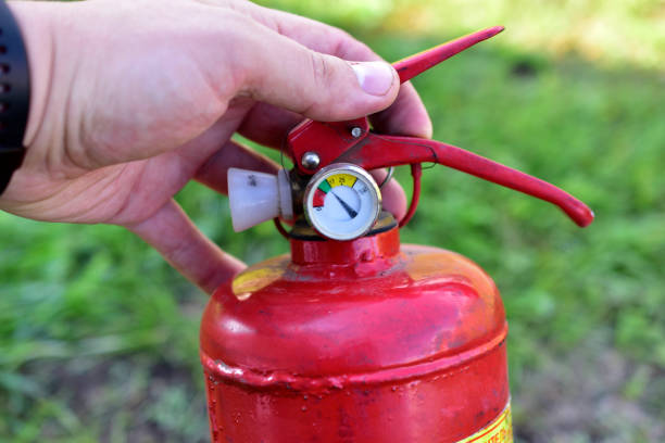 istock Red balloon hand extinguisher in the garden 1262386364