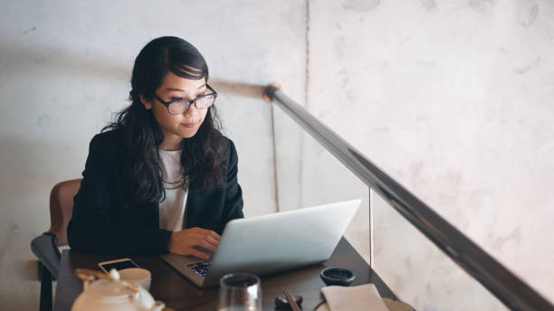 istock Young businesswoman working at restaurant 1262386381