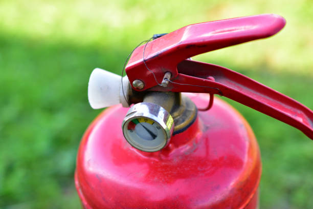 istock Red balloon hand extinguisher in the garden 1262386544