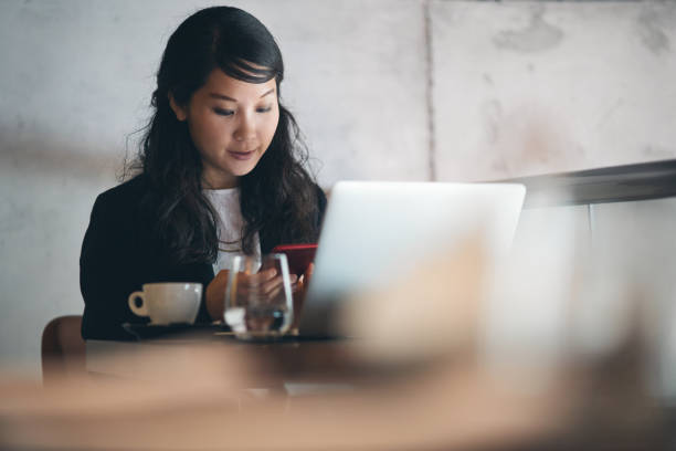 istock Young businesswoman working at restaurant 1262389108