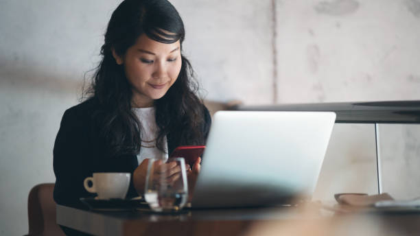 istock Young businesswoman working at restaurant 1262389134