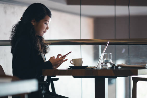 istock Young businesswoman working at restaurant 1262389177