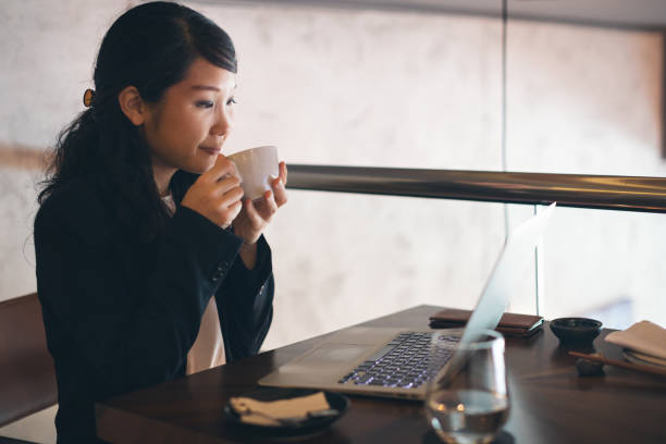 istock Young businesswoman working at restaurant 1262389388