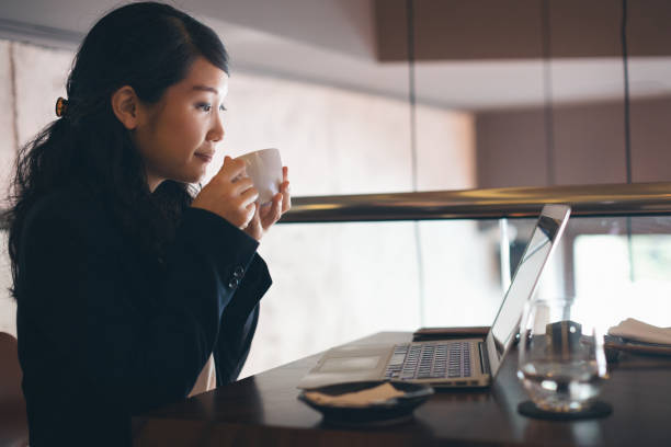 istock Young businesswoman working at restaurant 1262389416