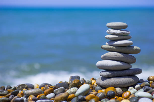istock Stack of zen stones near sea. Harmony, balance 1262390370