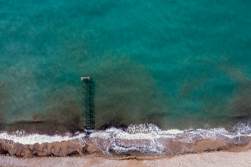 Aerial view of the jetty and sea. Taken via drone.