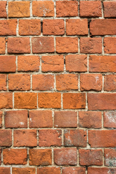 istock brick red wall texture. background of a old brick house. 1262394764