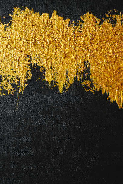 istock Abstract acrylic background with black and gold texture pallete. 1262397274