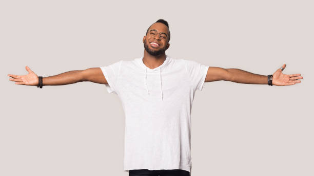 istock Smiling black man stretch hands show big sales 1262402113