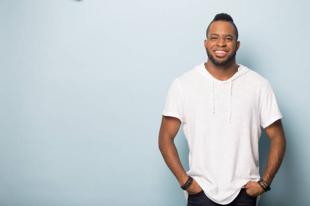 istock Smiling black man isolated in studio near blank copy space 1262402844