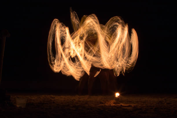 istock Fire juggler on the beach, photo 2 1262403925