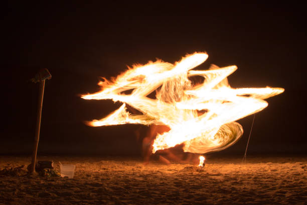 istock Fire juggler on the beach, photo 1 1262404508