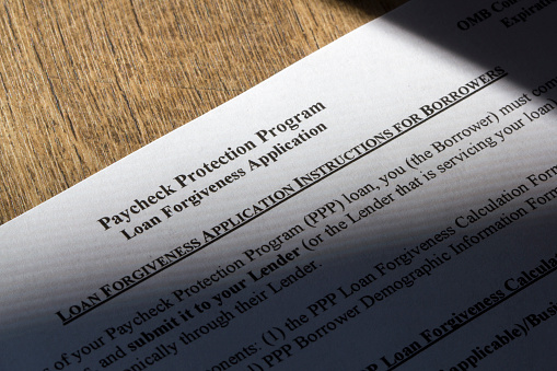 Closeup of SBA's Paycheck Protection Program (PPP) Loan Forgiveness Application Instructions For Borrowers document.