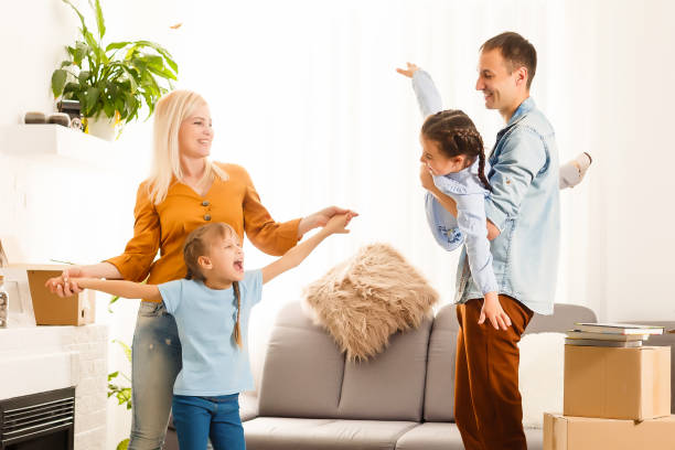 istock family moving into their new home 1262412874
