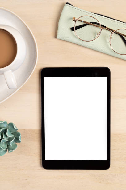 istock Styled minimal desktop mockup with organic color stationary, coffee cup, notepad. Freelancer, social media blogger concept. Flat lay, top view, copy space. 1262413950