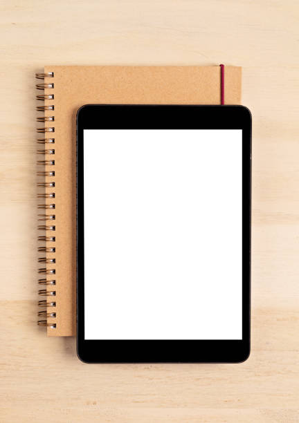 istock Styled minimal desktop mockup with organic color stationary, digital tablet, notepad. Freelancer, social media blogger concept. Flat lay, top view, copy space. 1262413956