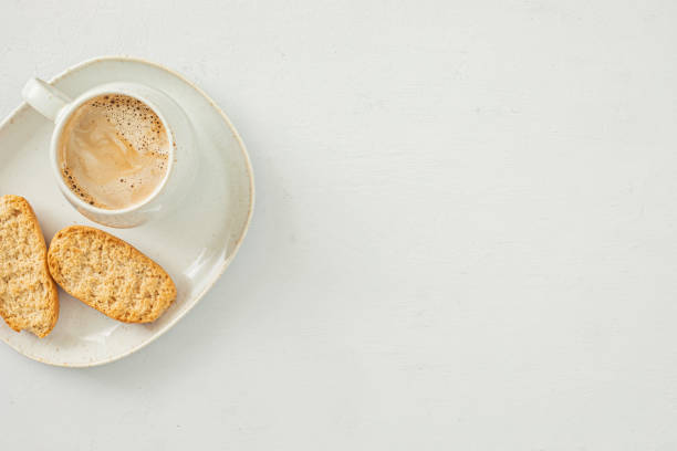 istock Styled minimal desktop mockup with coffee cup and crackers. Breakfast, Freelancer, social media blogger concept. Flat lay, top view 1262413961