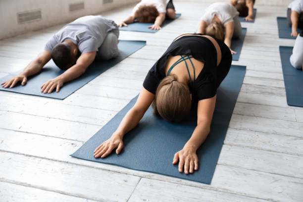 istock Diverse people relaxing after intensive workout indoors. 1262414033