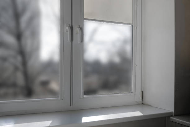 istock White room and window. Empty window with a sill and shutters. 1262415764